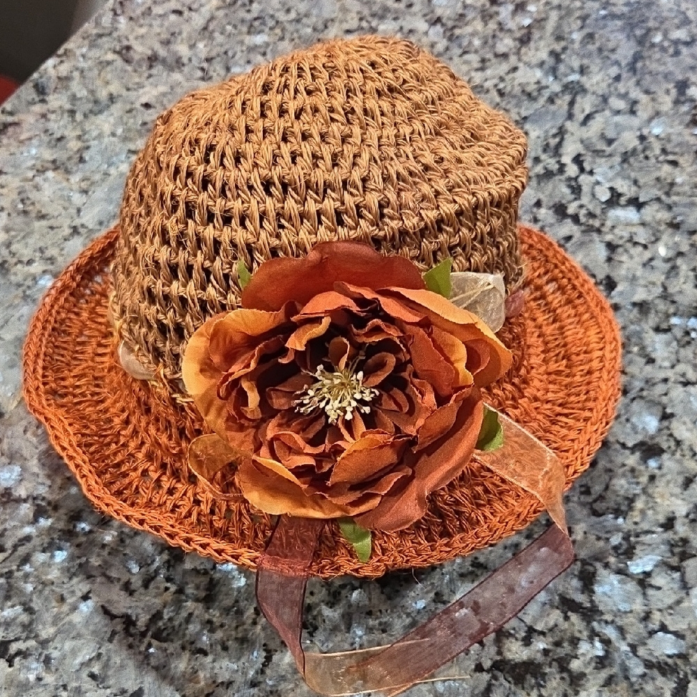 Woven Hat with Orange Flower Accent